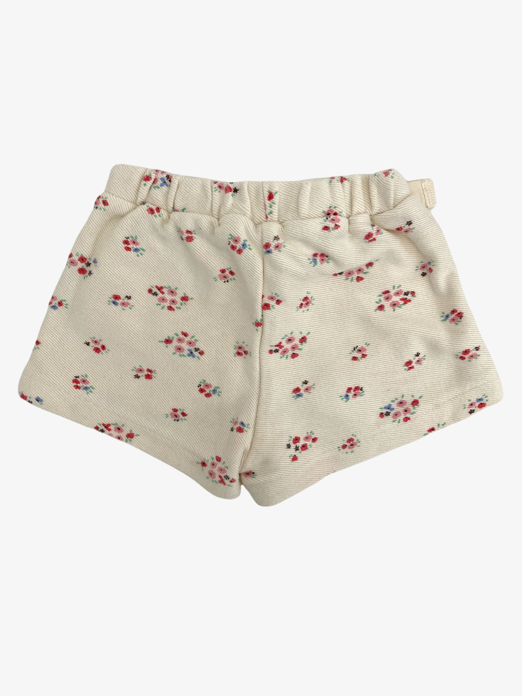 Gebloemde korte broek • Tweedehands korte broek van merk Zara in maat 68 •  Tweedehands Kinderkleding • Restory